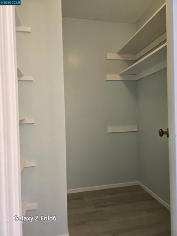 a view of small space with racks on the wall