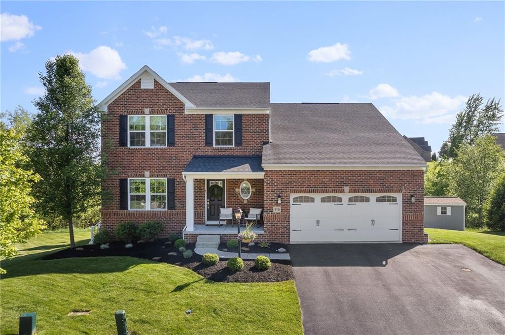 110 Brook Side Drive Clinton, PA 15026 - Photo 1 of 49 a front view of a house with garden