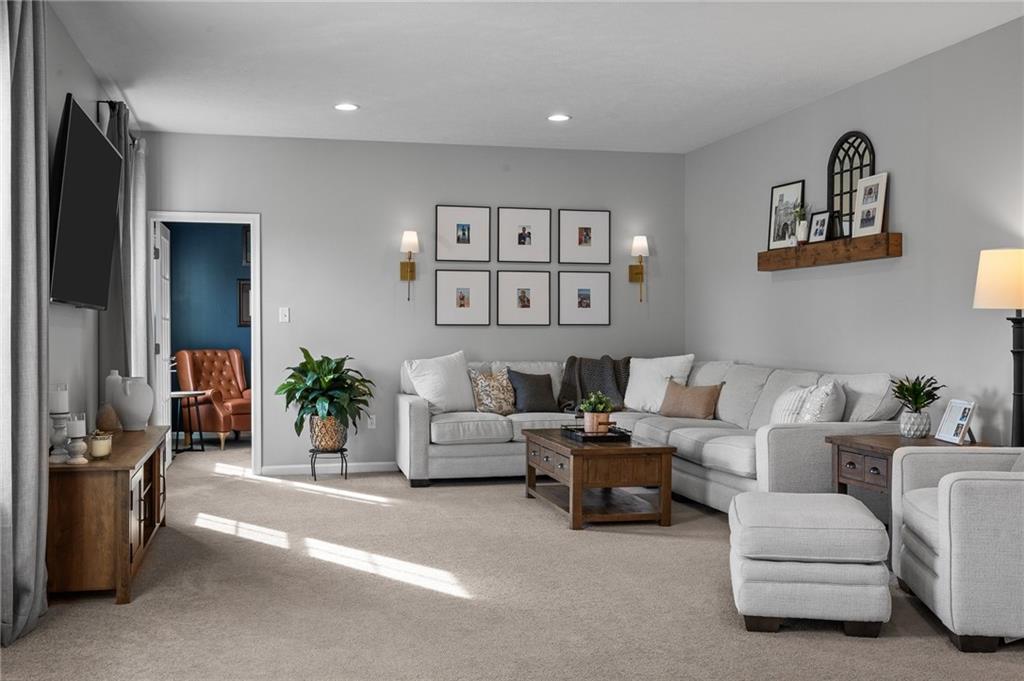 110 Brook Side Drive Clinton, PA 15026 - Photo 12 of 49 a living room with furniture and a flat screen tv