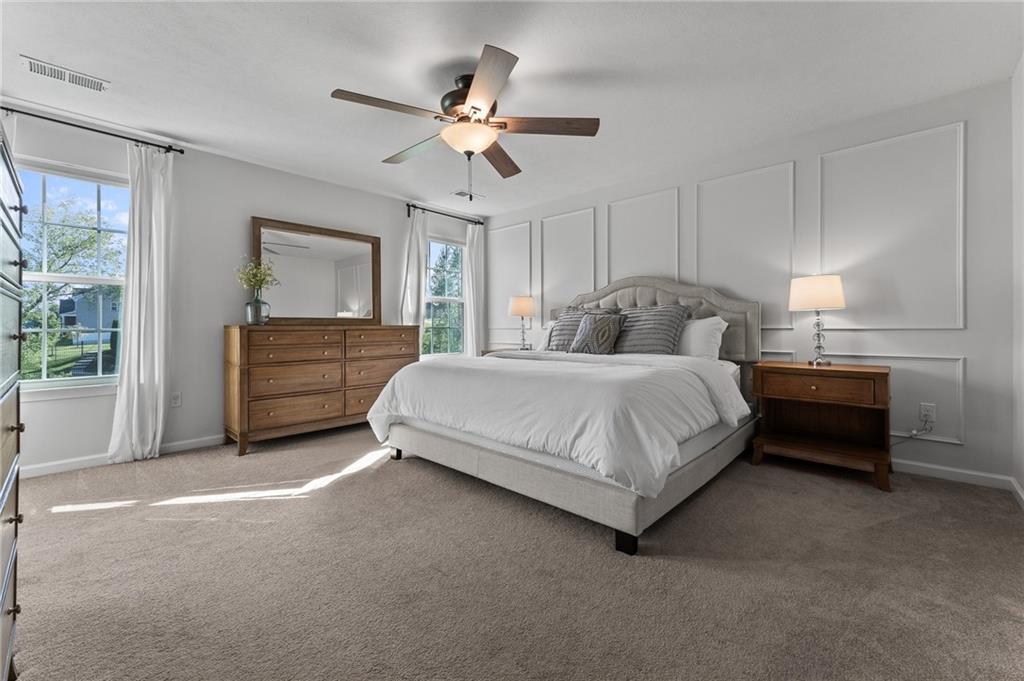 110 Brook Side Drive Clinton, PA 15026 - Photo 23 of 49 a bedroom with a bed and ceiling fan