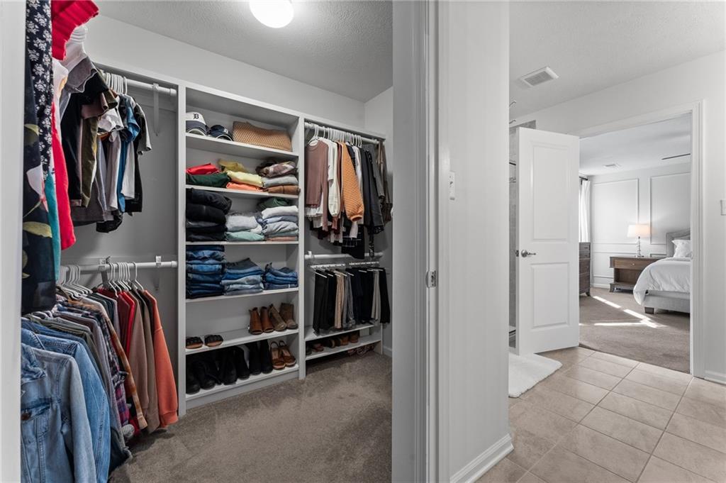 110 Brook Side Drive Clinton, PA 15026 - Photo 28 of 49 a view of walk in closet with clothes and shoes