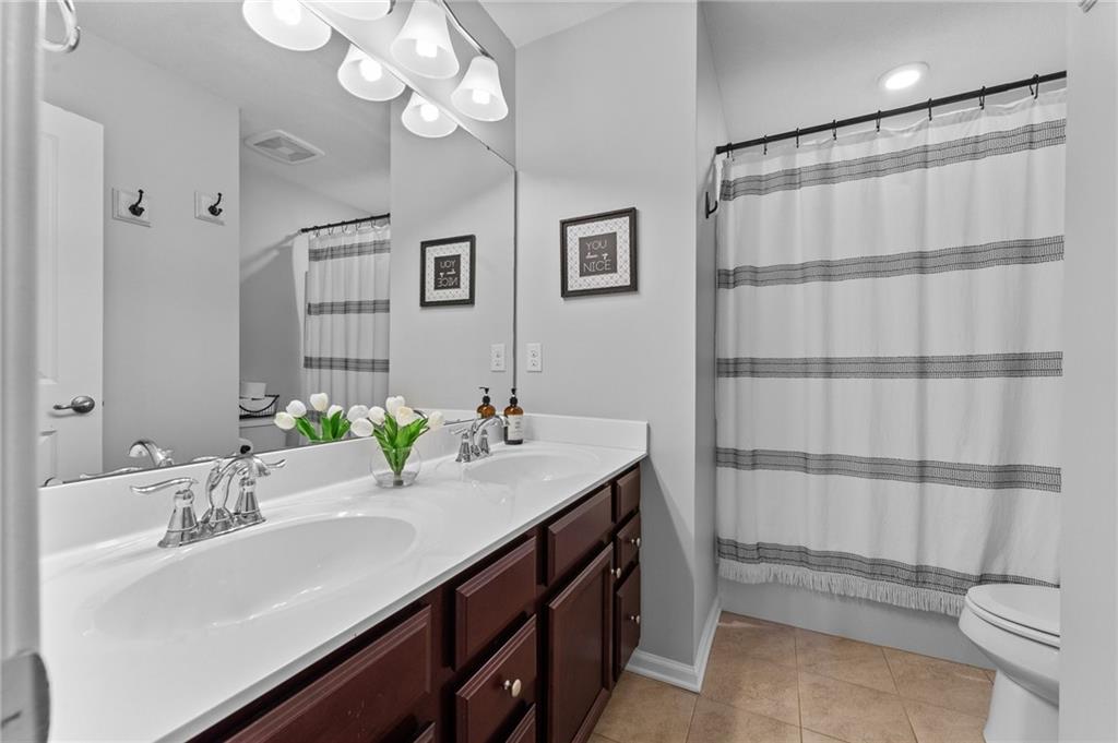 110 Brook Side Drive Clinton, PA 15026 - Photo 33 of 49 a bathroom with a sink a toilet and shower