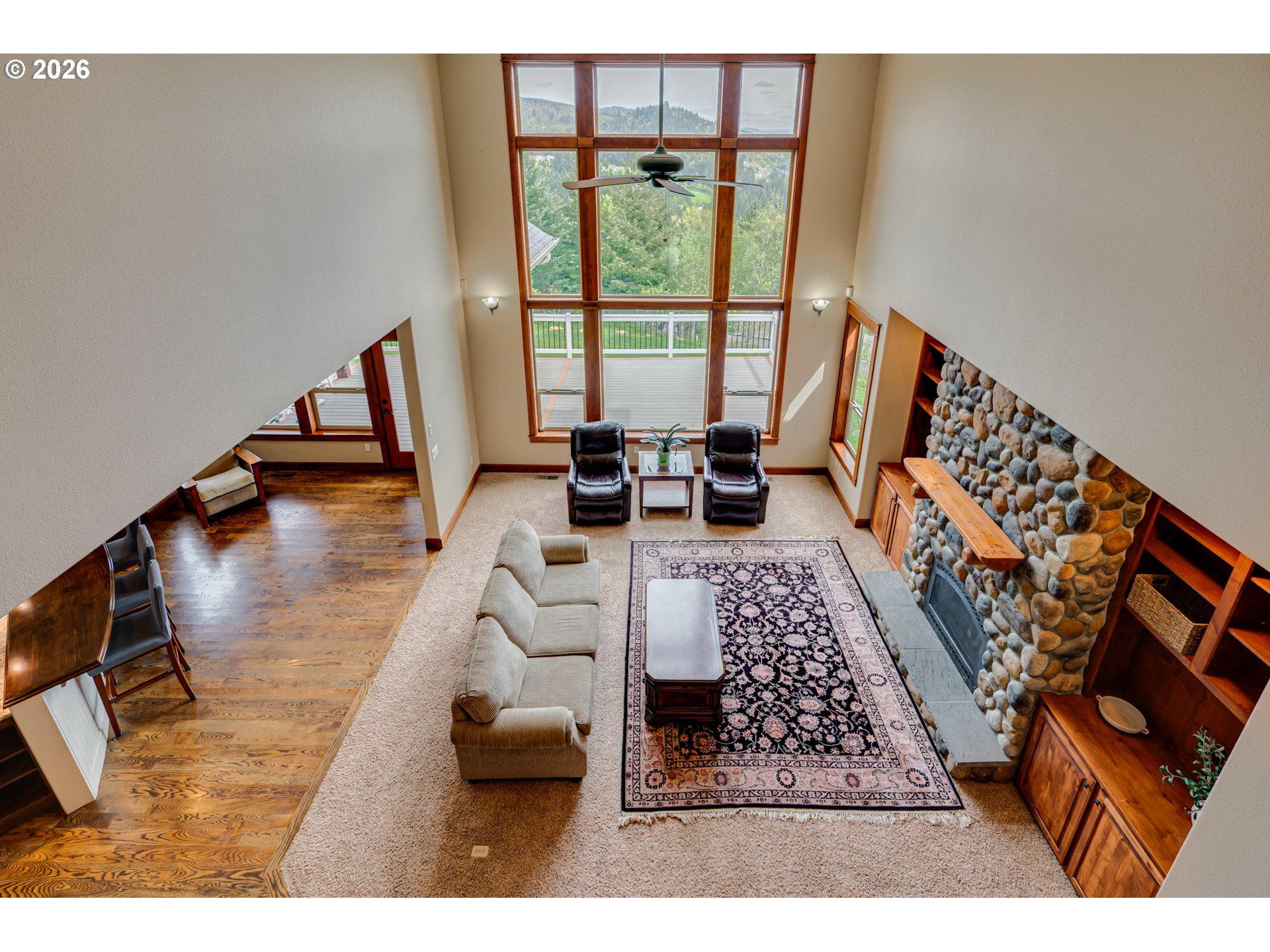200 Pine Ridge Drive Woodland, WA 98674 - Photo 21 of 48 a living room with furniture and a rug
