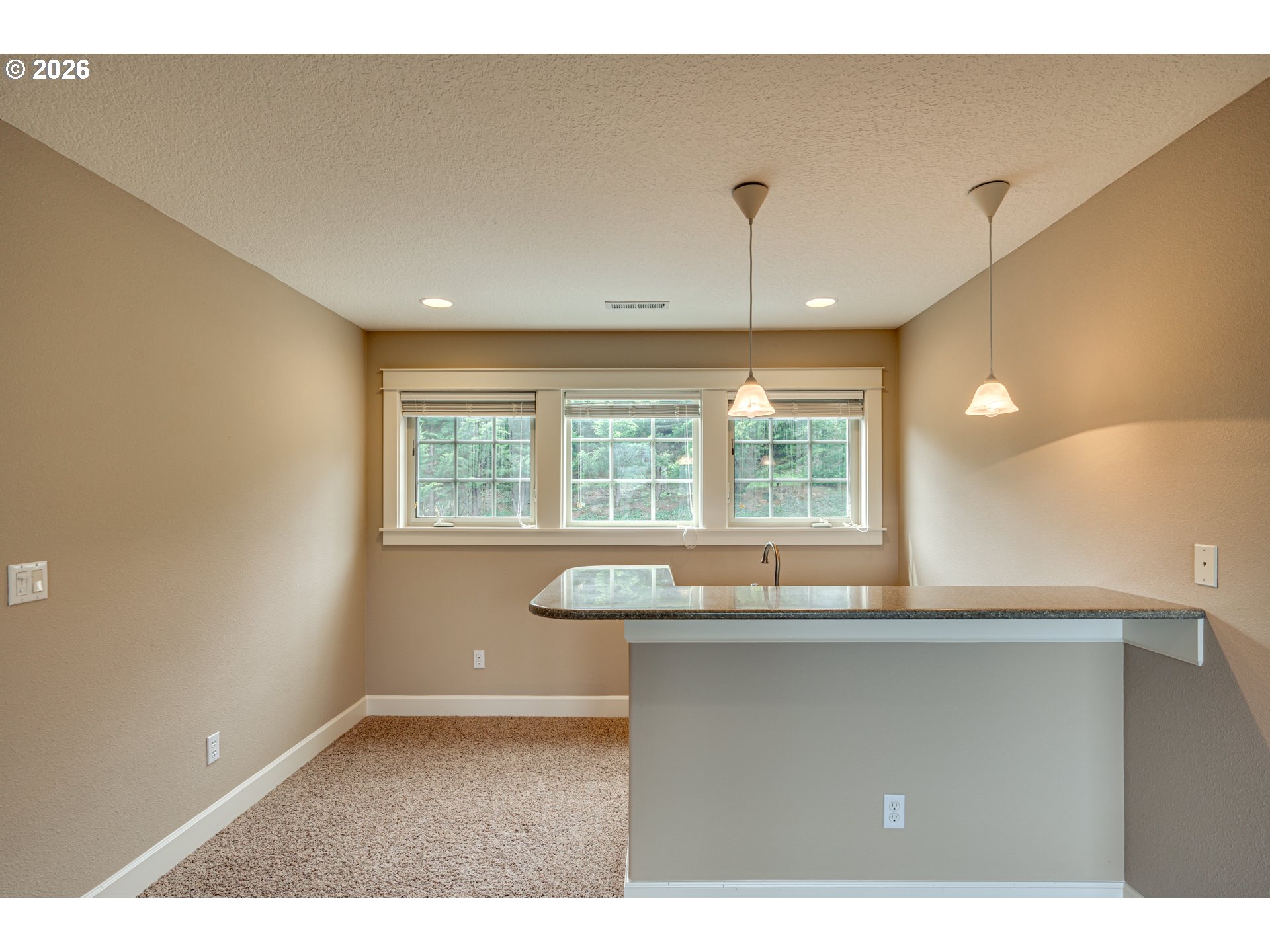 200 Pine Ridge Drive Woodland, WA 98674 - Photo 25 of 48 a kitchen with a window and a kitchen counter