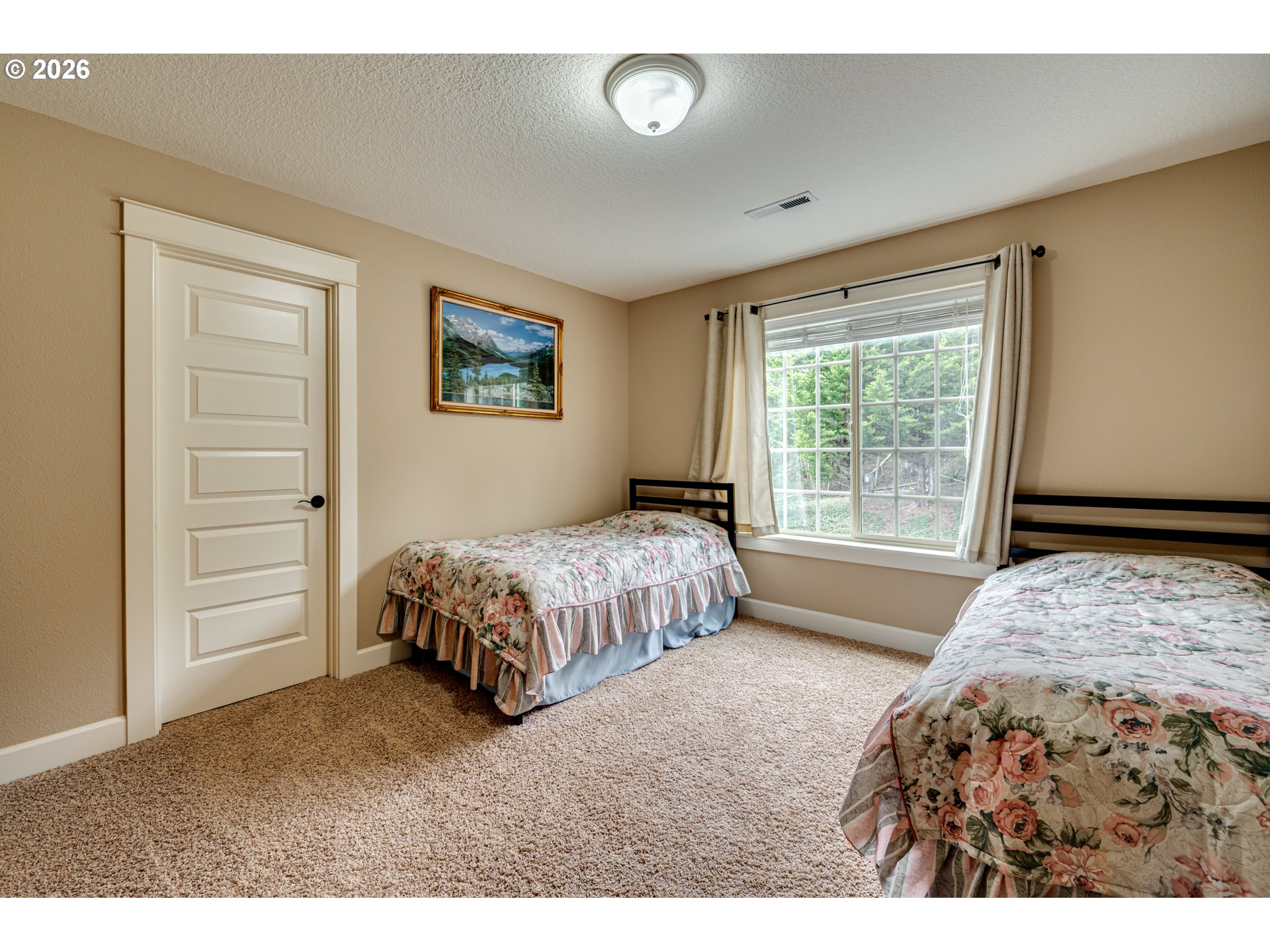 200 Pine Ridge Drive Woodland, WA 98674 - Photo 29 of 48 a bedroom with a bed and a window