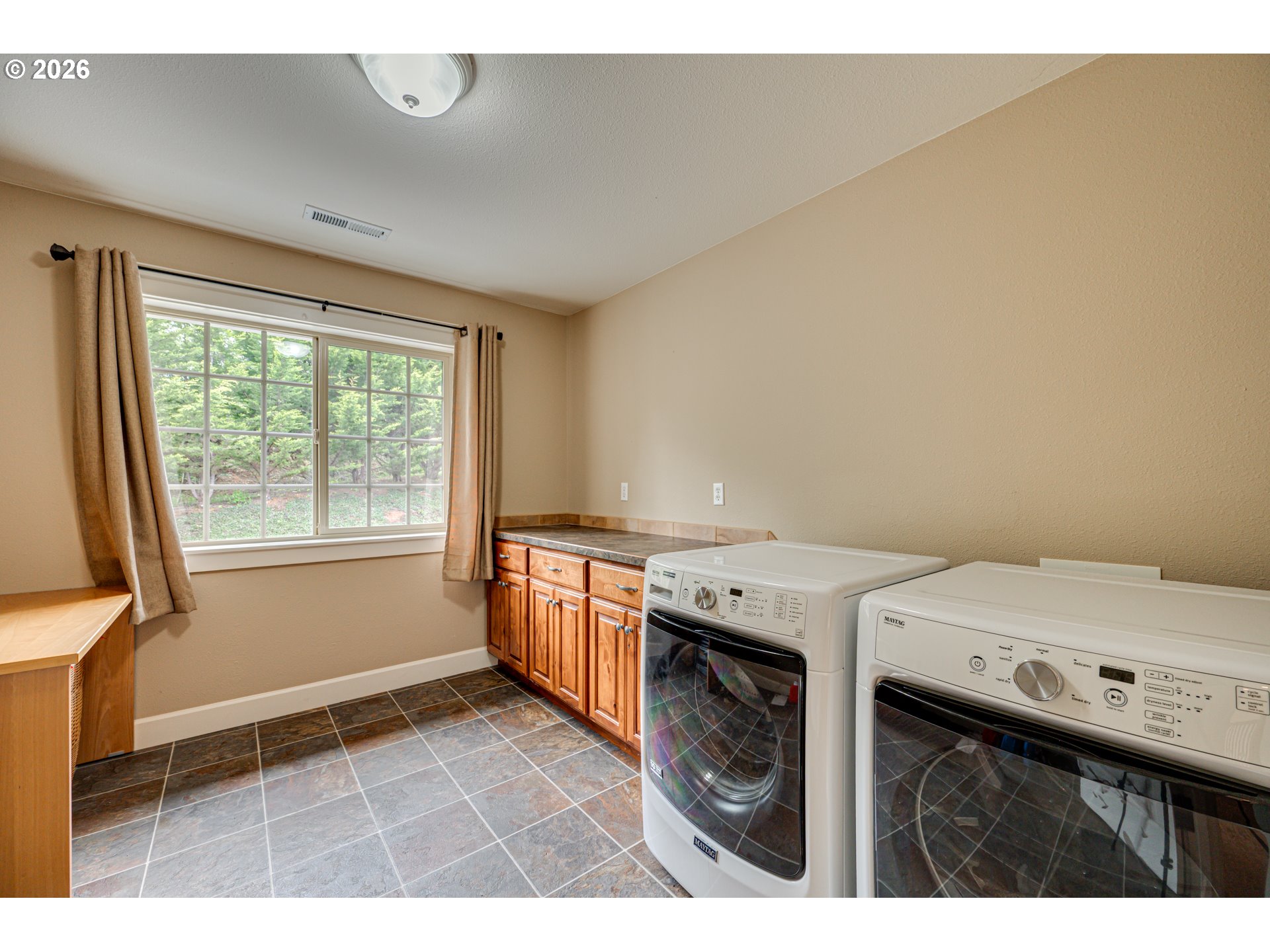 200 Pine Ridge Drive Woodland, WA 98674 - Photo 30 of 48 a utility room with dryer and washer