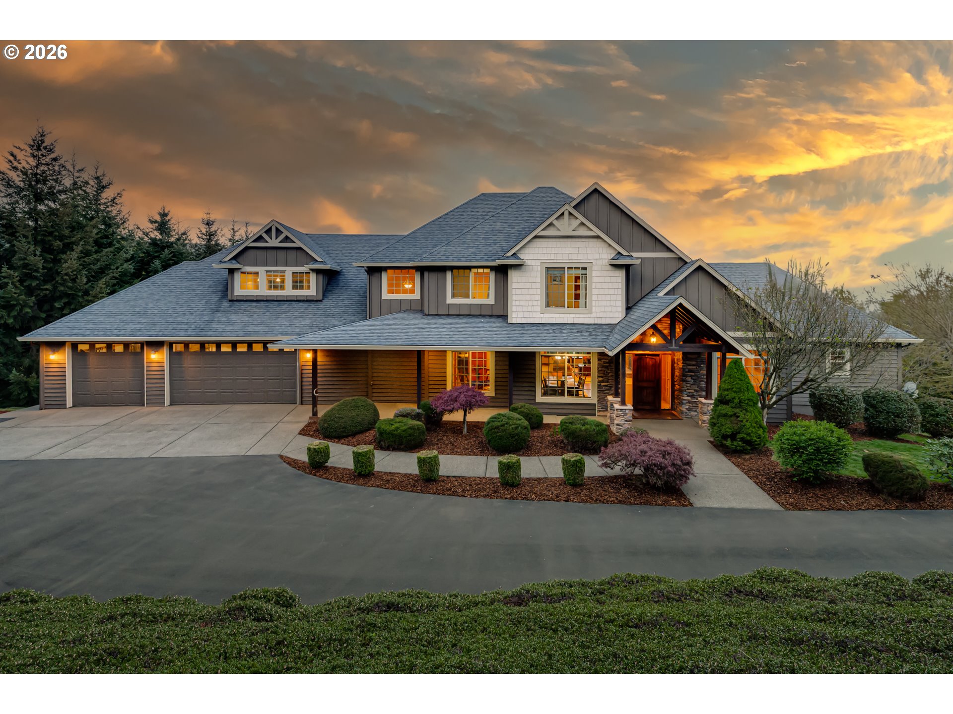 200 Pine Ridge Drive Woodland, WA 98674 - Photo 47 of 48 a front view of a house with a yard and garage