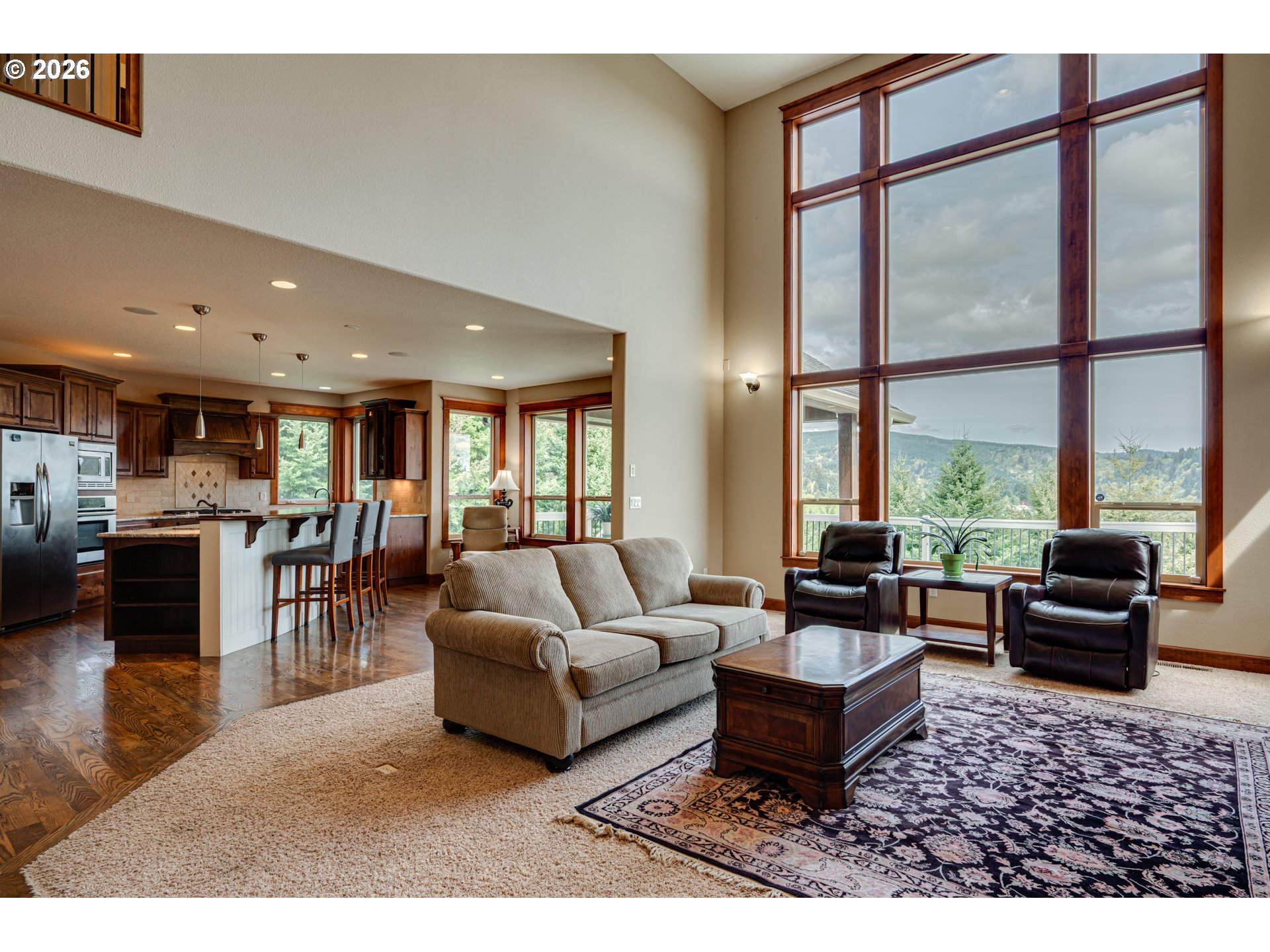200 Pine Ridge Drive Woodland, WA 98674 - Photo 10 of 48 a living room with furniture and a large window
