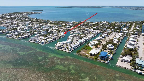 a view of swimming pool with outdoor seating
