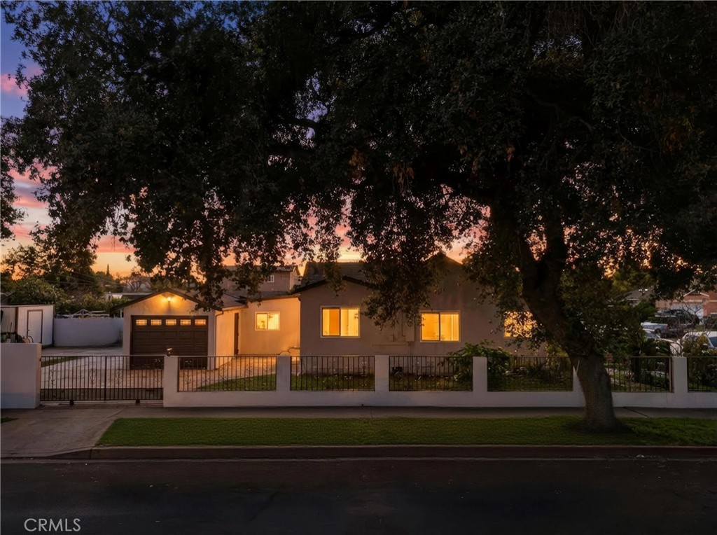 2101 South Hickory Street Santa Ana, CA 92707 - Photo 2 of 44 a front view of a house with a yard
