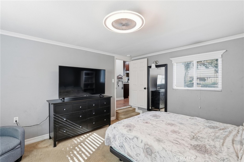2101 South Hickory Street Santa Ana, CA 92707 - Photo 21 of 44 a bedroom with a bed and a flat screen tv