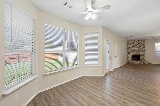 a view of livingroom with hardwood floor and window