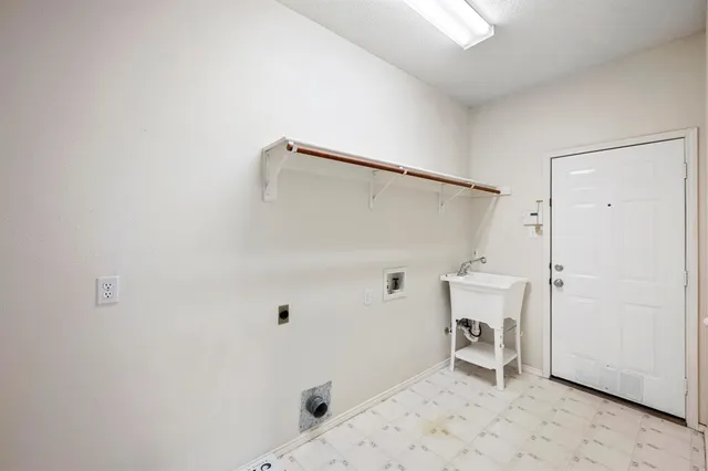 a bathroom with a sink and a shower