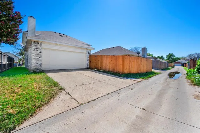 a view of a backyard of house