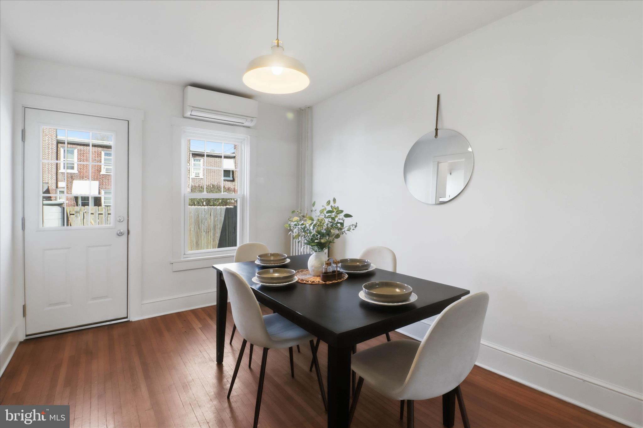 521 Hamilton Street Lancaster, PA 17602 - Photo 13 of 44 a view of a dining room with furniture and wooden floor