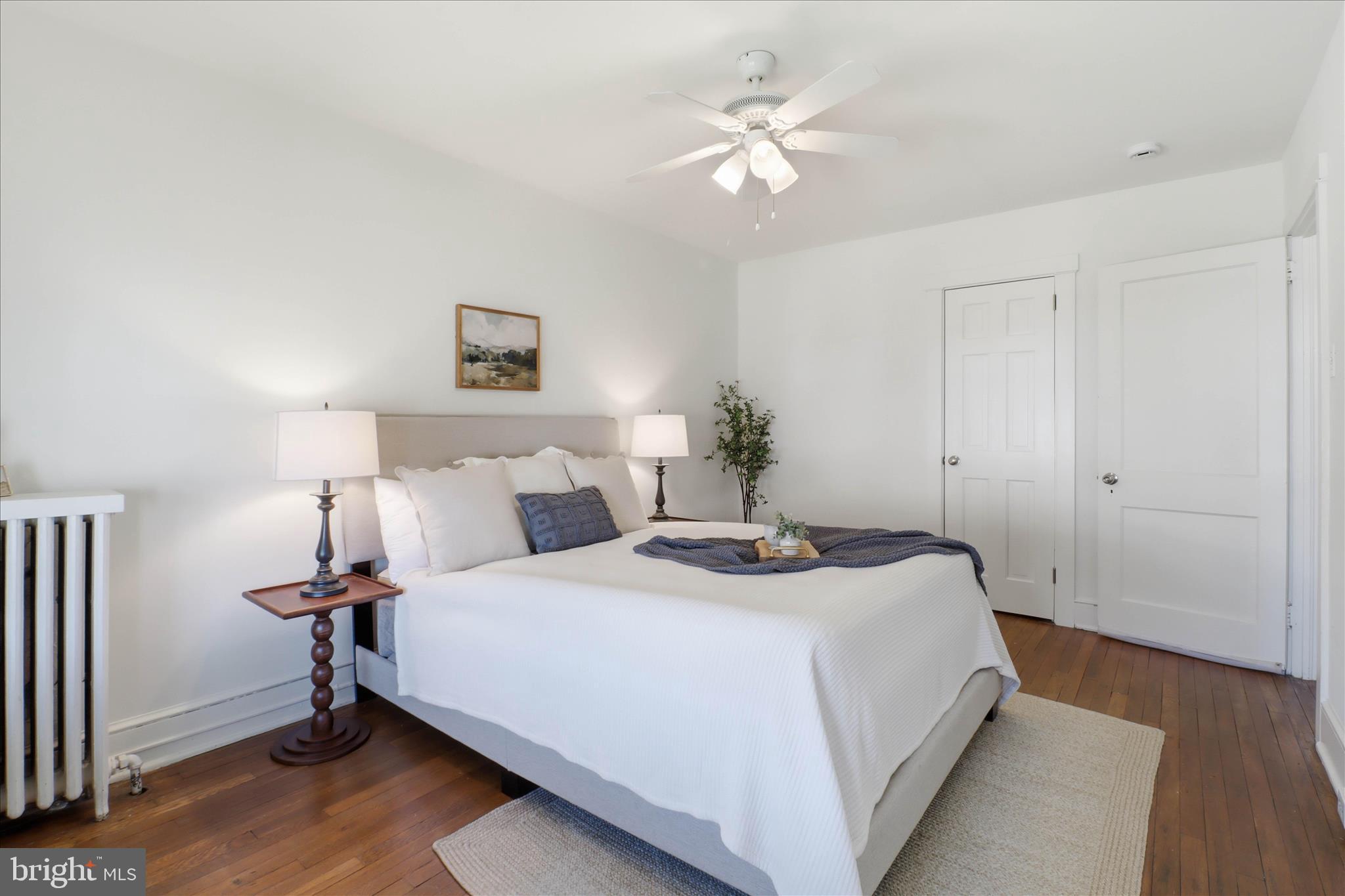 521 Hamilton Street Lancaster, PA 17602 - Photo 21 of 44 a bedroom with a bed and a chandelier