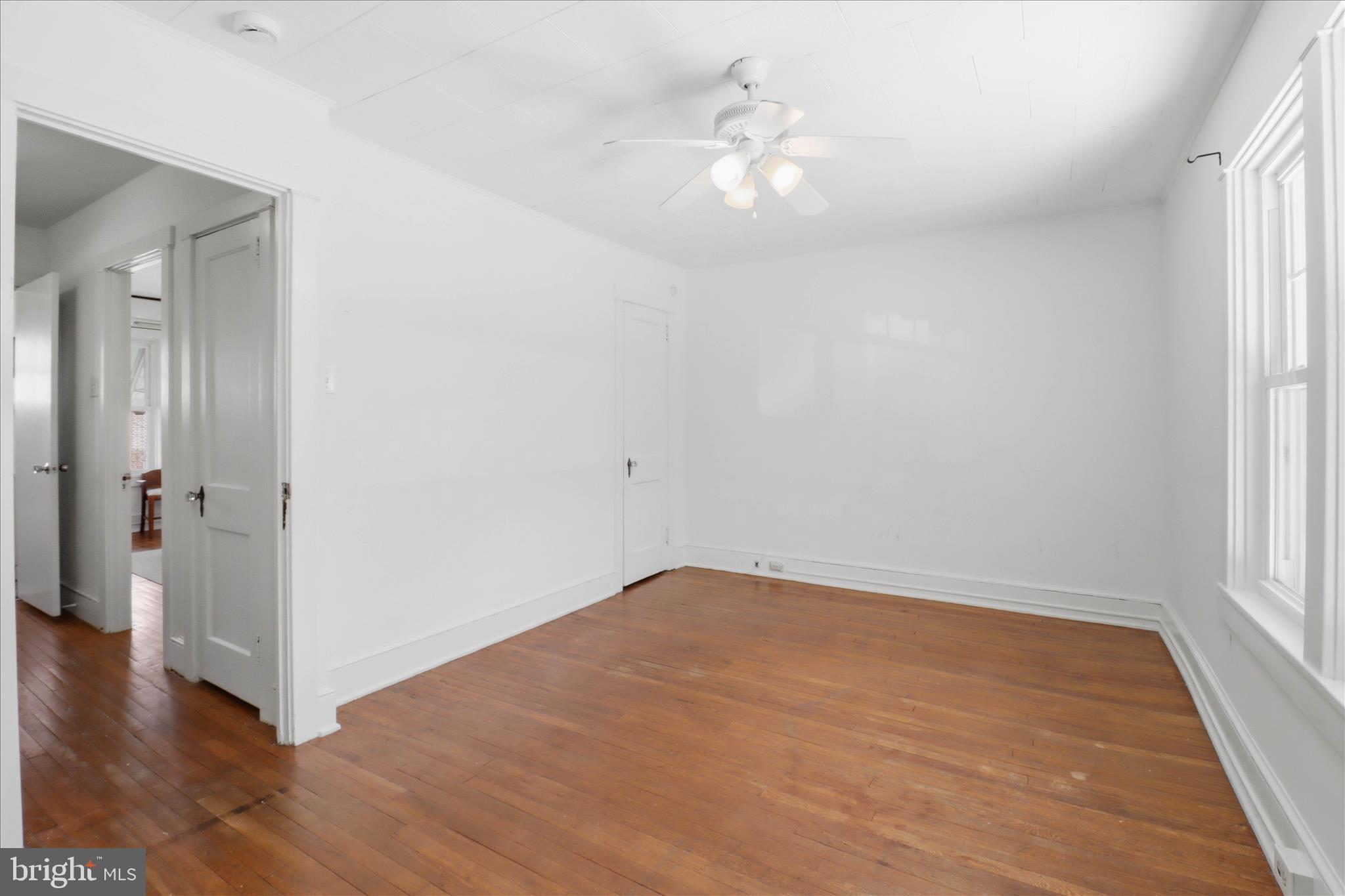521 Hamilton Street Lancaster, PA 17602 - Photo 24 of 44 wooden floor in an empty room with a window