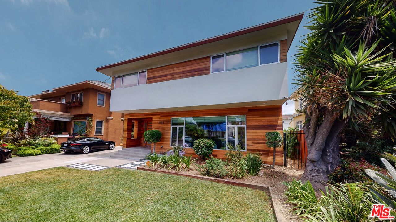 1848 Virginia Road Los Angeles, CA 90019 - Photo 3 of 39 a view of a building with a patio
