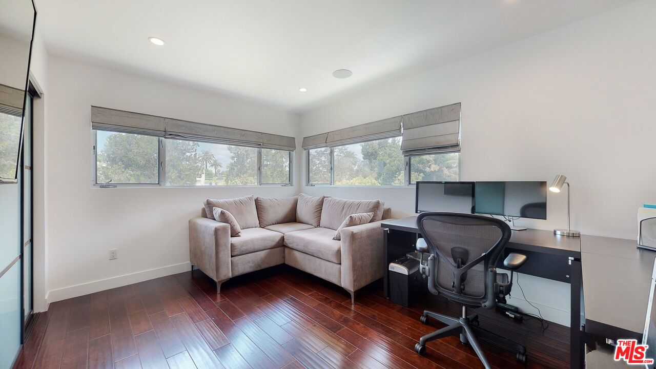 1848 Virginia Road Los Angeles, CA 90019 - Photo 30 of 39 a living room with furniture and a window