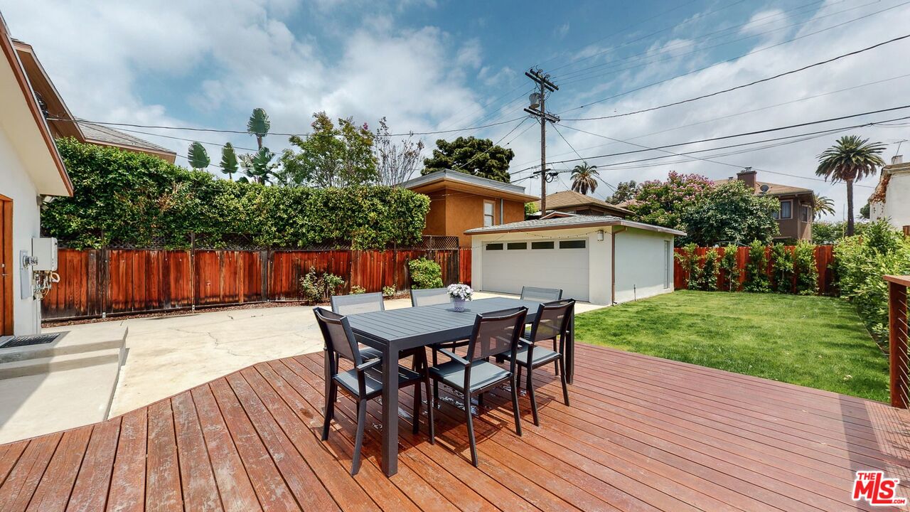 1848 Virginia Road Los Angeles, CA 90019 - Photo 35 of 39 a outdoor dining space with furniture and wooden floor