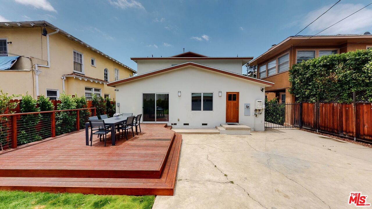 1848 Virginia Road Los Angeles, CA 90019 - Photo 39 of 39 a view of a house with wooden deck and sitting area