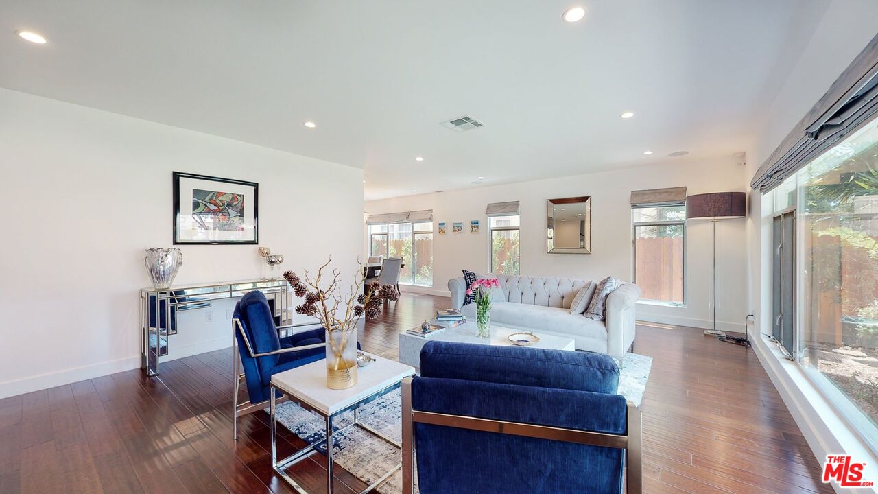 1848 Virginia Road Los Angeles, CA 90019 - Photo 6 of 39 a living room with furniture and wooden floor