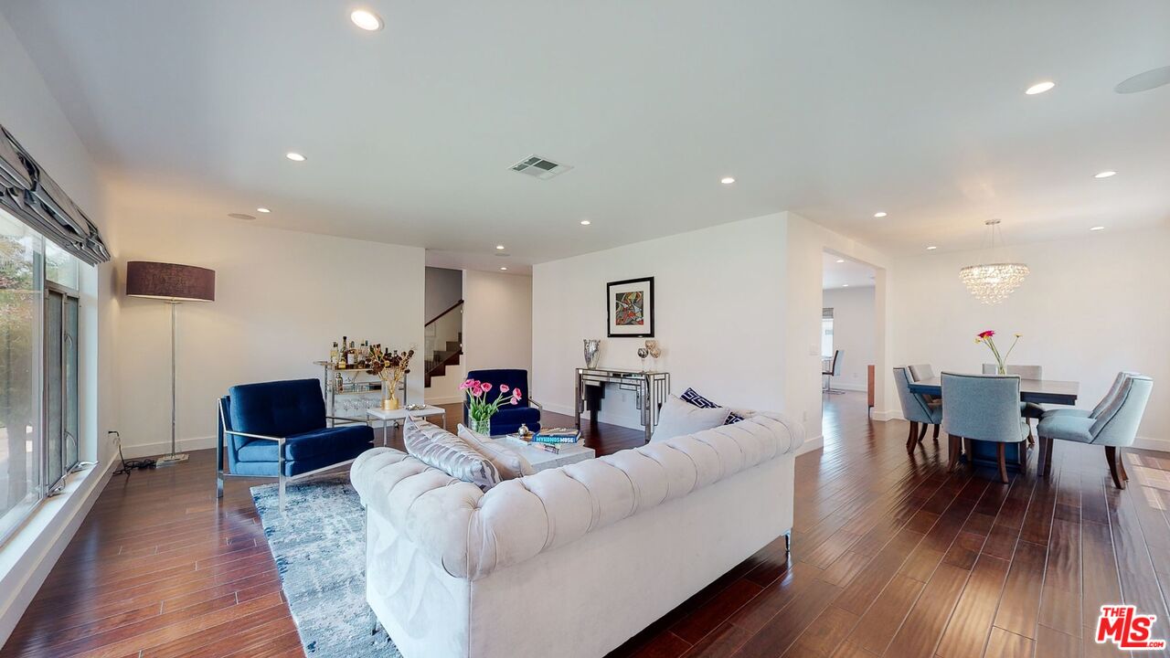 1848 Virginia Road Los Angeles, CA 90019 - Photo 8 of 39 a living room with furniture and a wooden floor