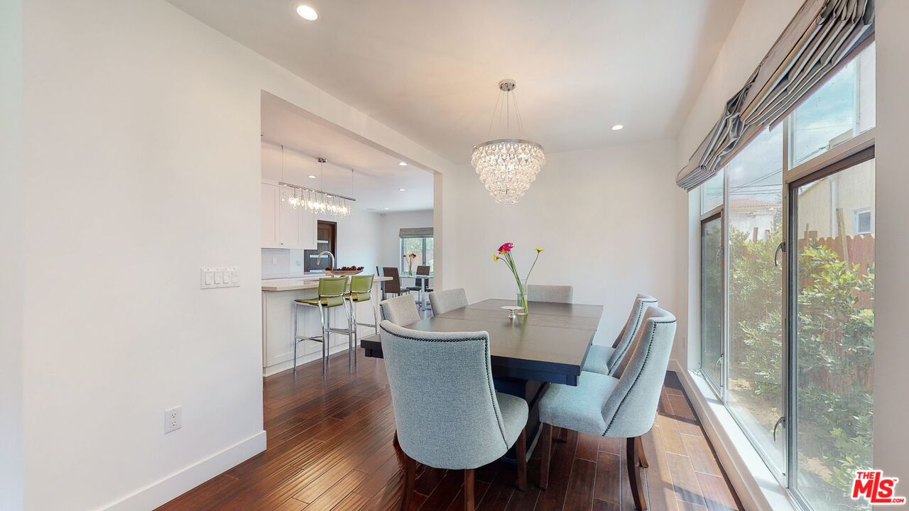 1848 Virginia Road Los Angeles, CA 90019 - Photo 9 of 39 a view of a dining room with furniture and wooden floor