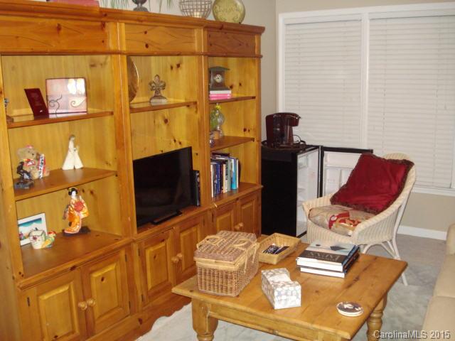 10116 Truitt Court Huntersville, NC 28078 - Photo 11 of 18 a living room with furniture and a flat screen tv