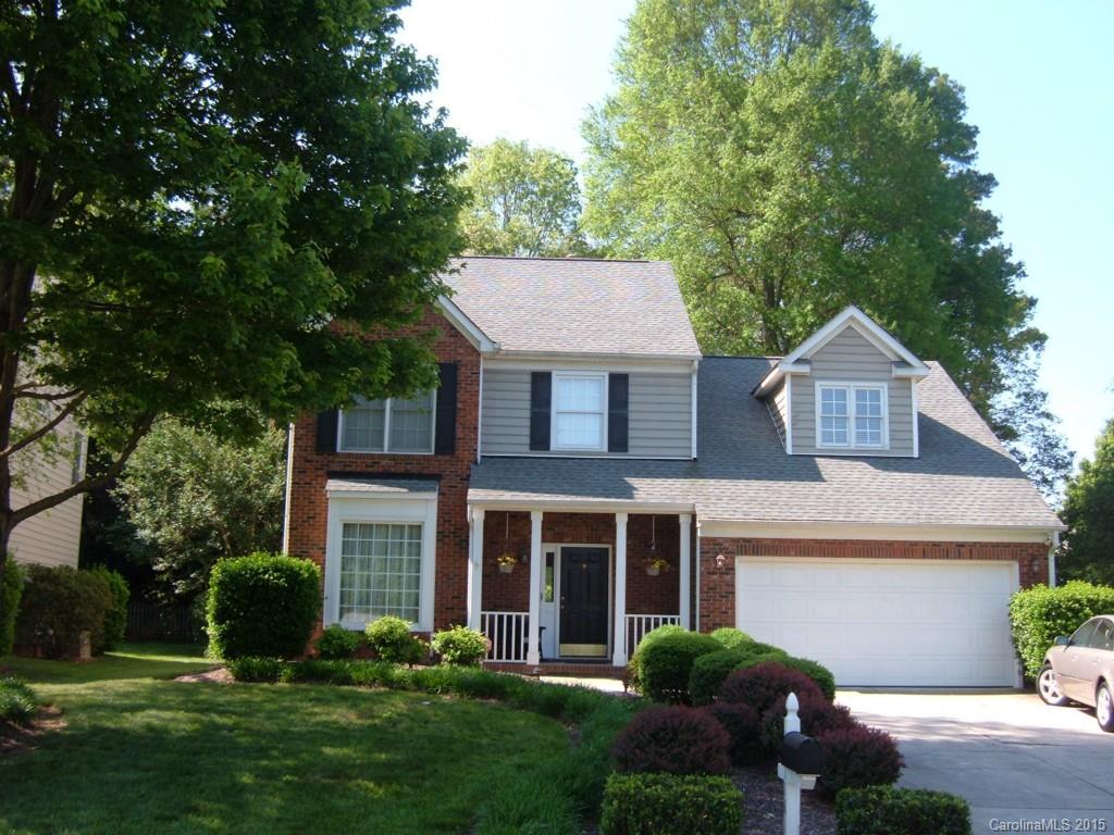 10116 Truitt Court Huntersville, NC 28078 - Photo 14 of 18 a front view of a house with a yard and garage