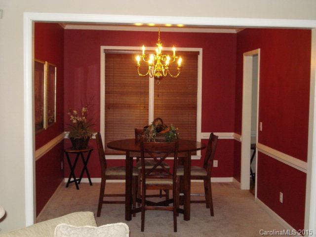 10116 Truitt Court Huntersville, NC 28078 - Photo 6 of 18 a view of a dining room with furniture and chandelier