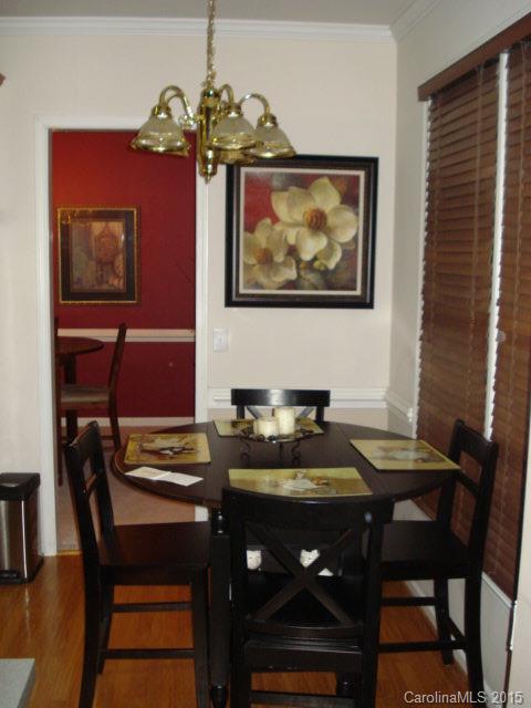 10116 Truitt Court Huntersville, NC 28078 - Photo 7 of 18 a view of a dining room with furniture