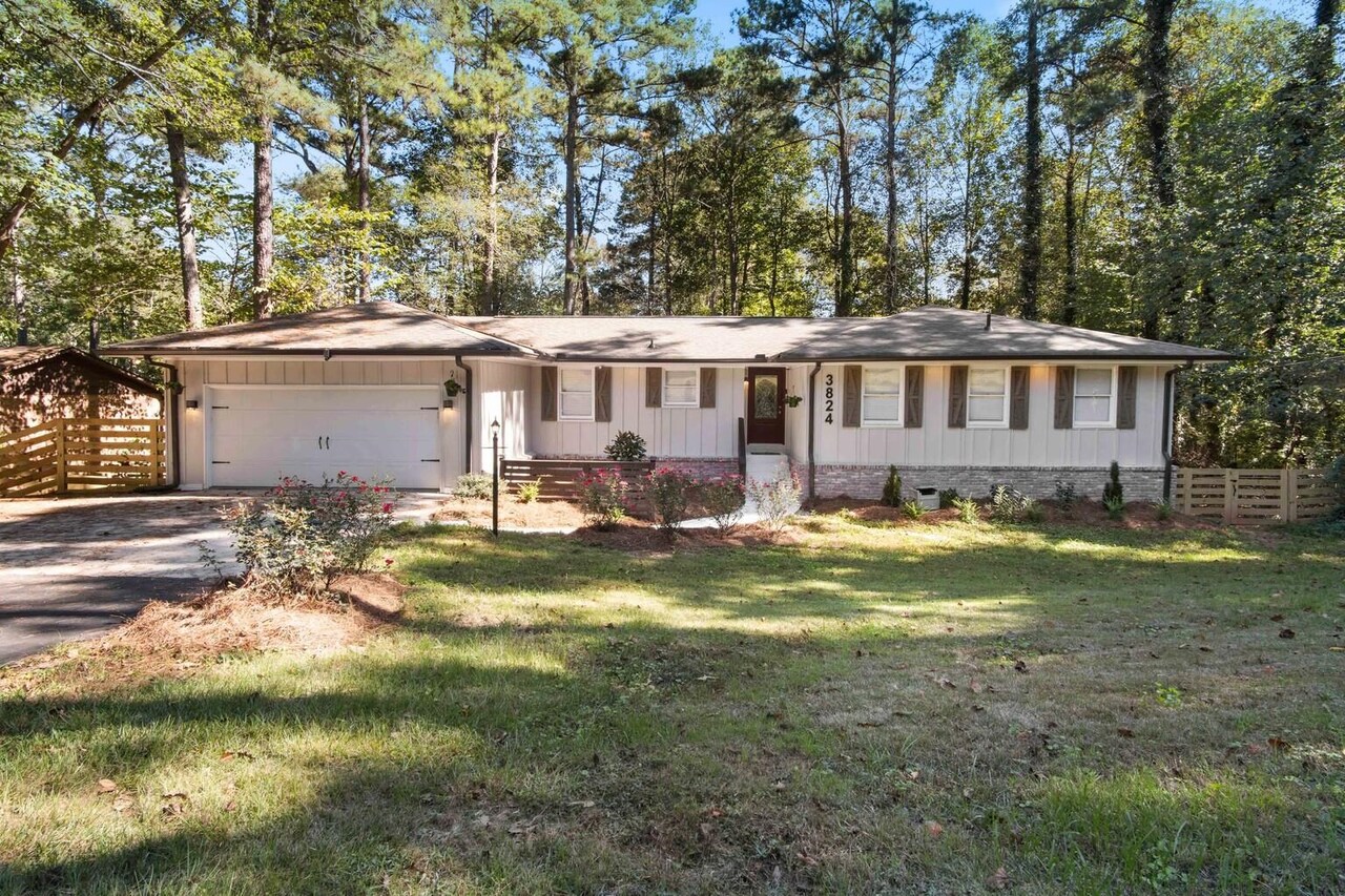 3824 Snapfinger Road Stonecrest, GA 30038 - Photo 1 of 1 a view of a house with a yard