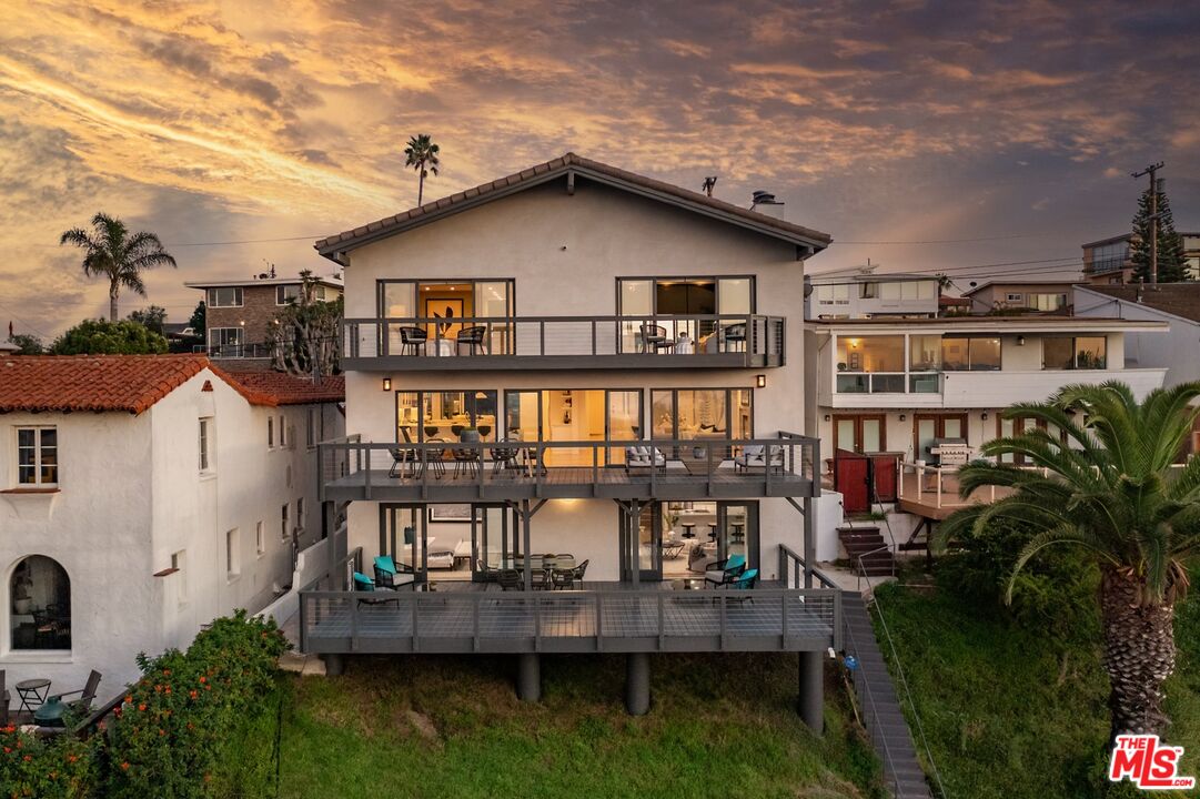 a aerial view of a house with swimming pool
