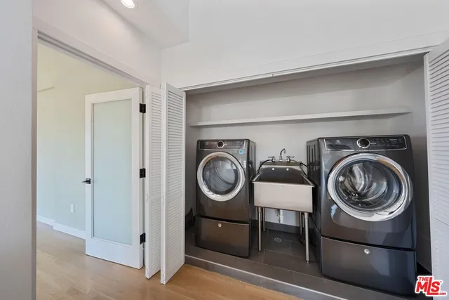 a view of multiple houses with a big yard