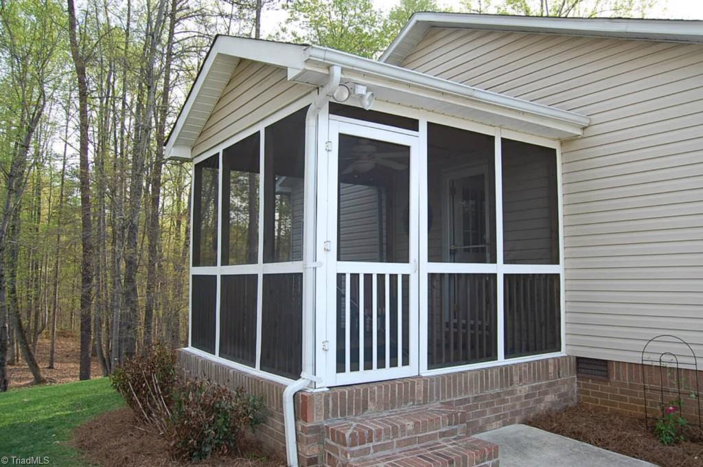 664 Spainhour Road King, NC 27021 - Photo 2 of 12 10' x 9'10" screened porch