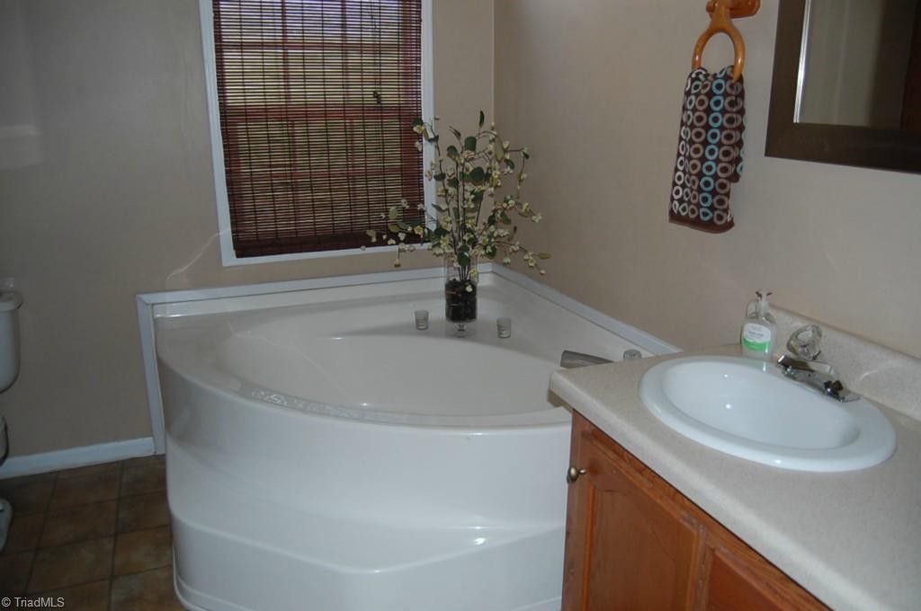 664 Spainhour Road King, NC 27021 - Photo 8 of 12 Master Bathroom garden tub.