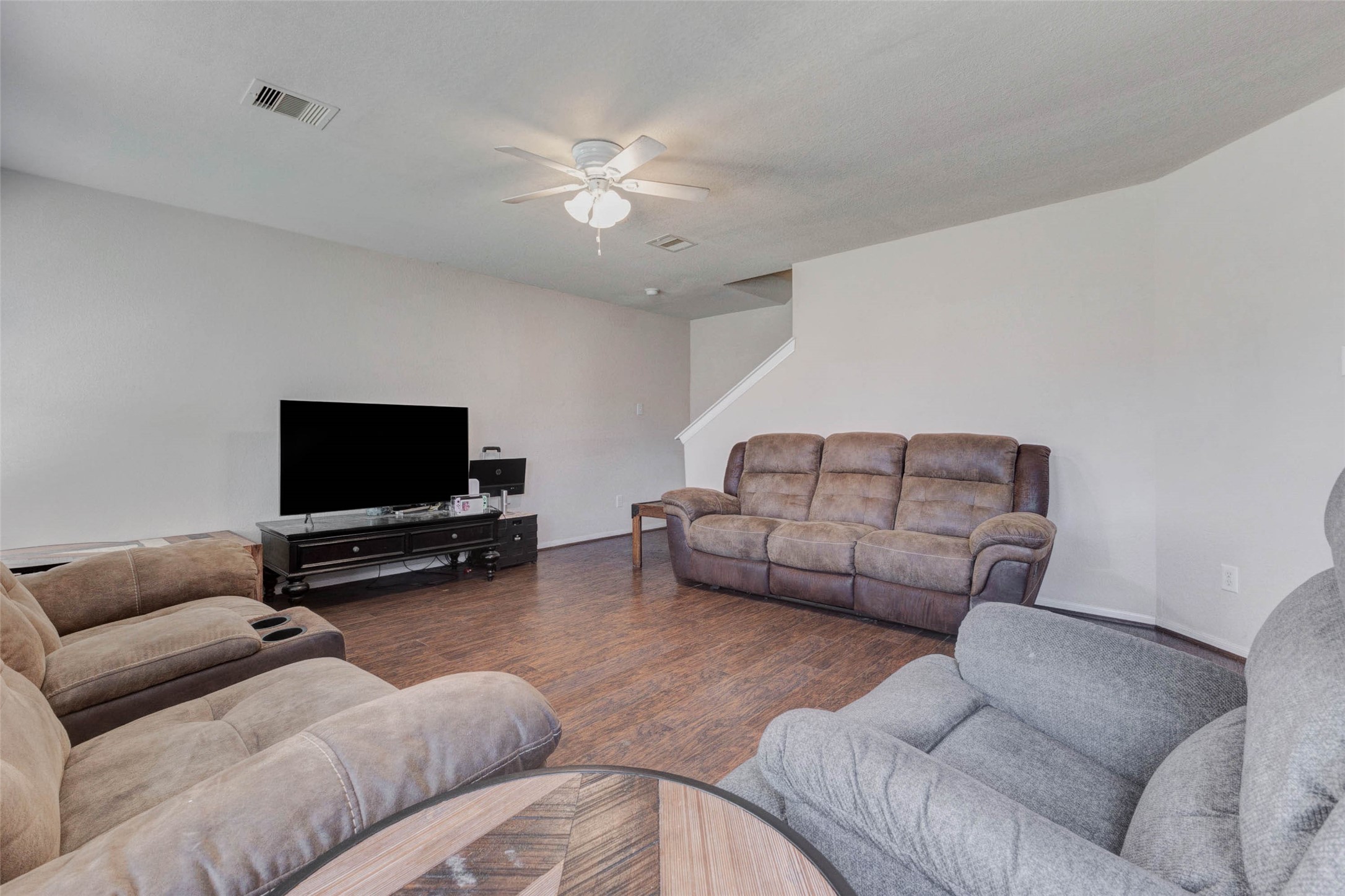 3027 Upland Spring Trace Katy, TX 77493 - Photo 12 of 29 a living room with furniture and a flat screen tv