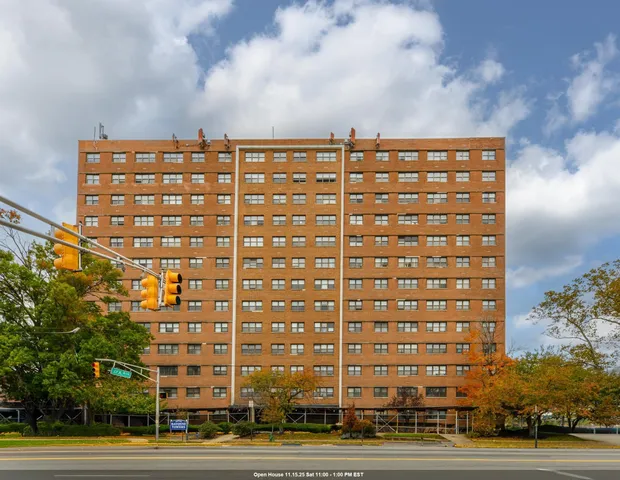 a view of a building with a street