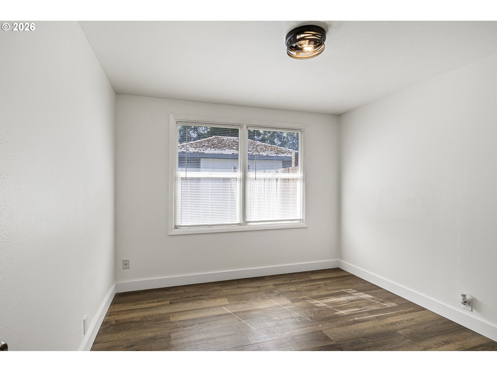 1008 Coburg Road Eugene, OR 97401 - Photo 14 of 46 an empty room with a window