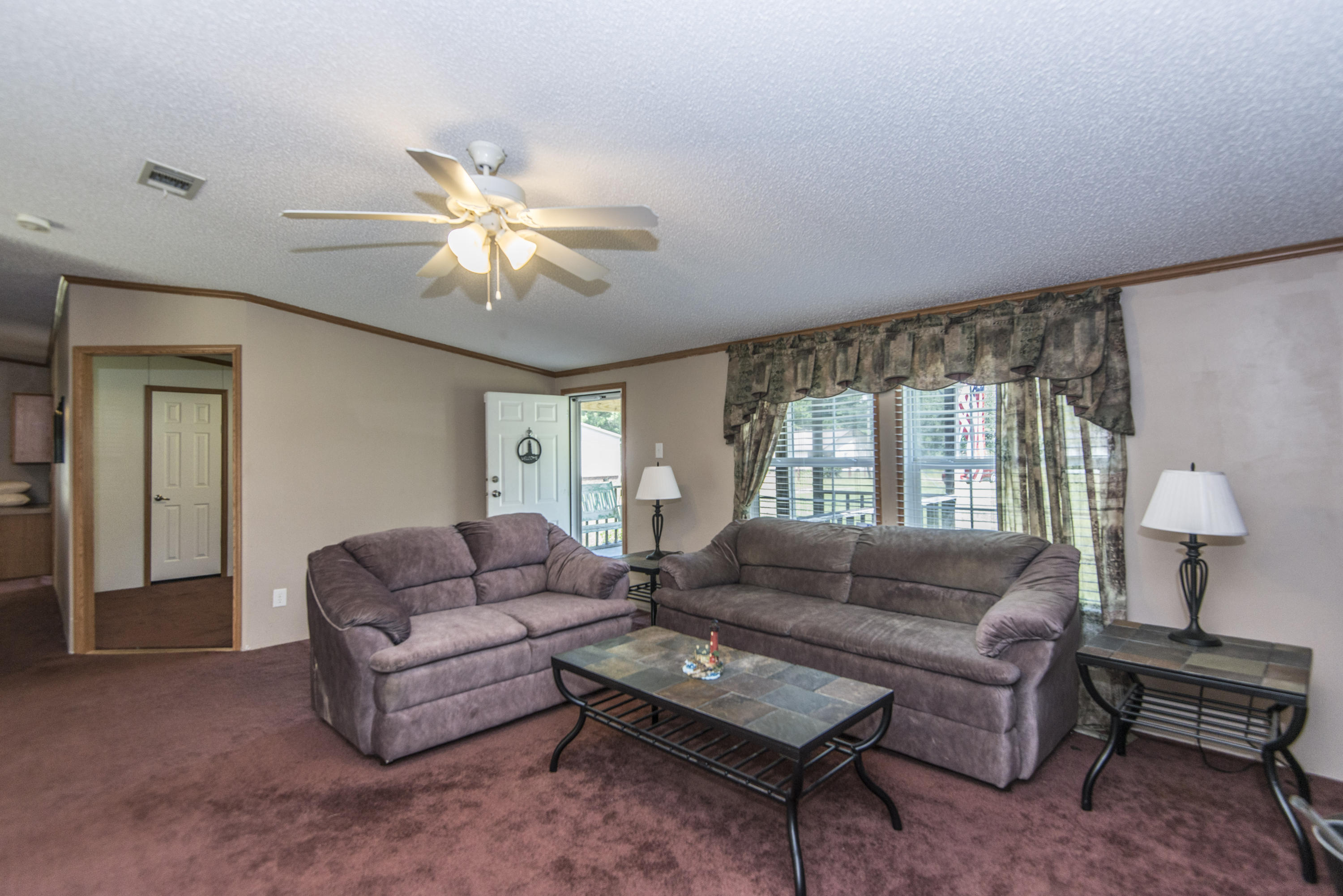 125 Little River Road Goose Creek, SC 29445 - Photo 3 of 33 125littleriverfamilyroomtodoor