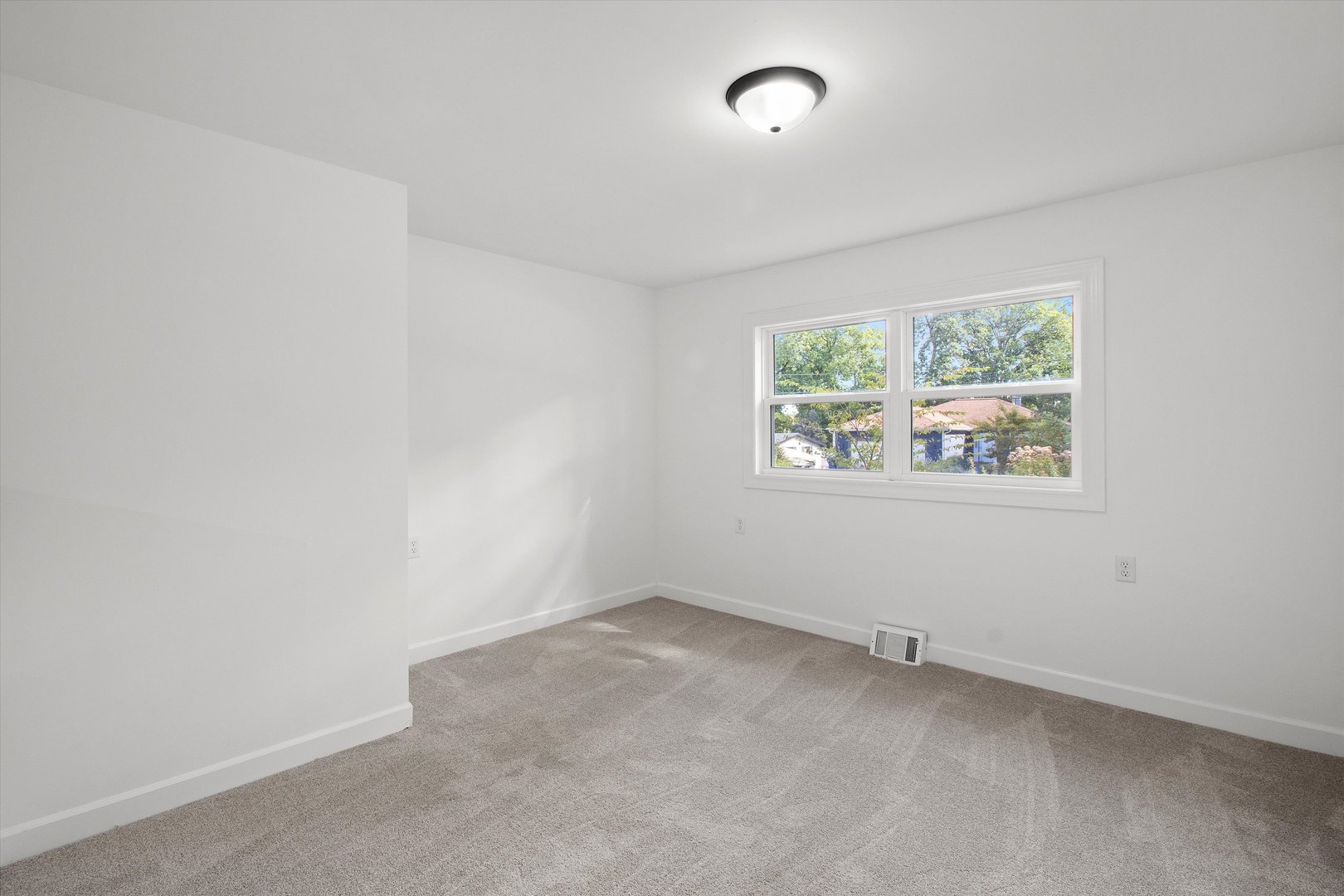 33448 North Greentree Road Grayslake, IL 60030 - Photo 18 of 49 an empty room with windows