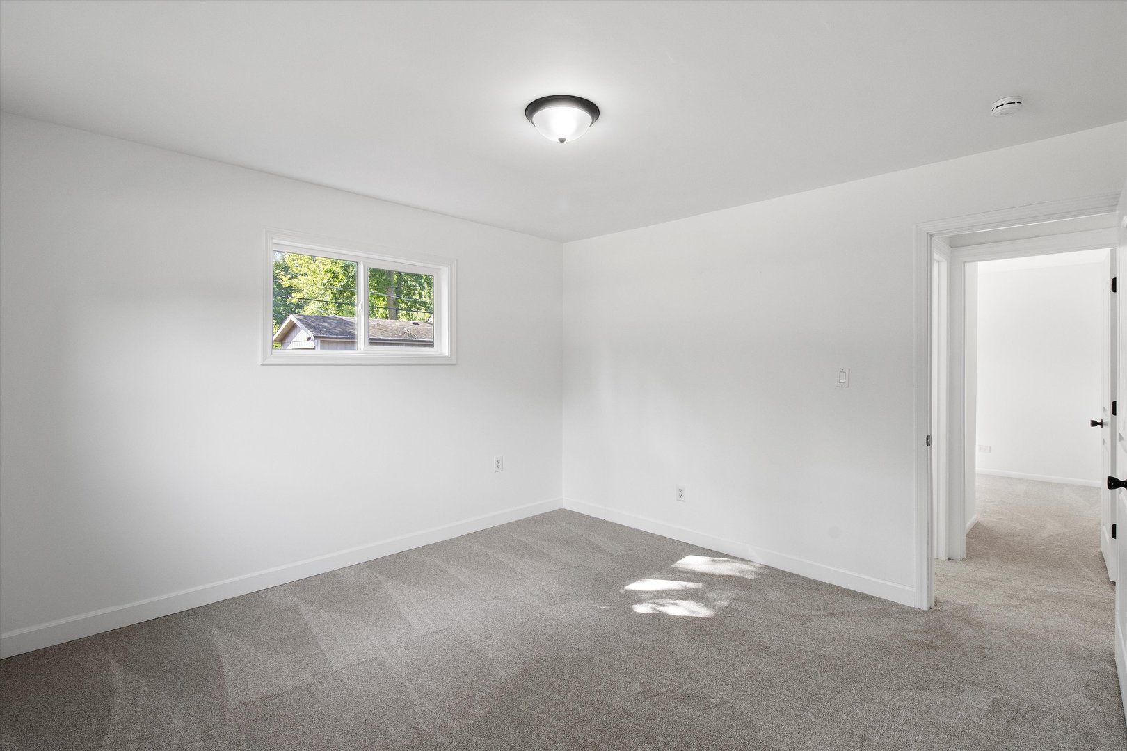 33448 North Greentree Road Grayslake, IL 60030 - Photo 22 of 49 an empty room with windows and ceiling fan