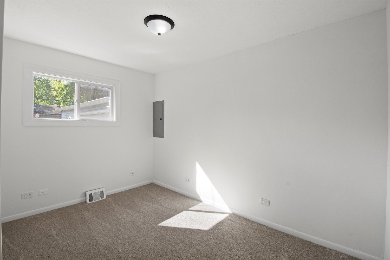 33448 North Greentree Road Grayslake, IL 60030 - Photo 24 of 49 an empty room with a window