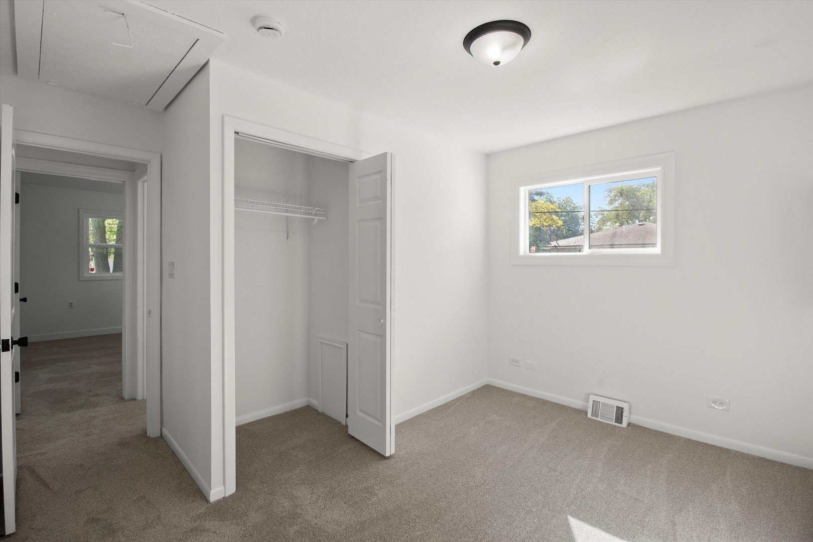 33448 North Greentree Road Grayslake, IL 60030 - Photo 25 of 49 an empty room with windows and closet