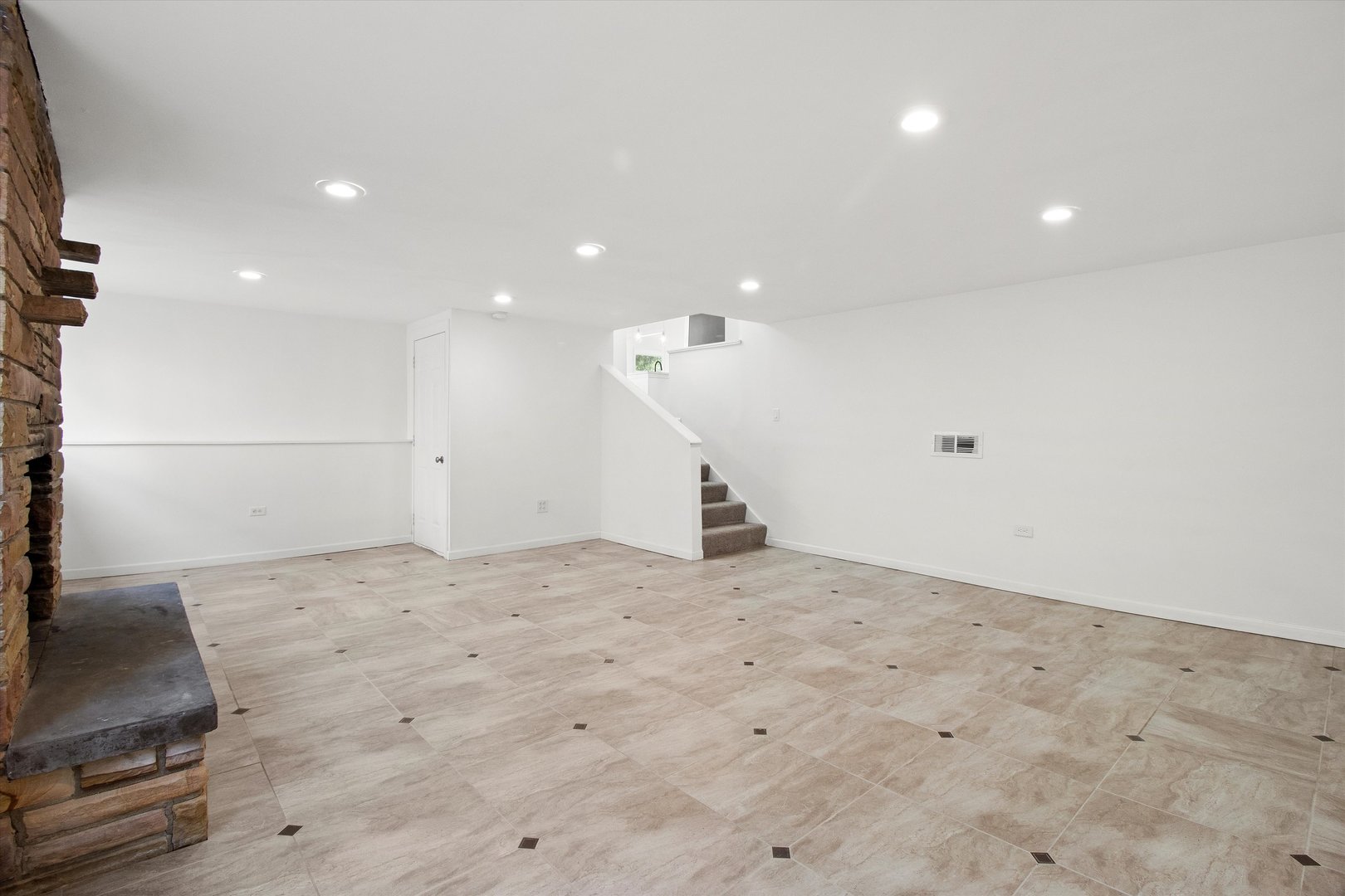 33448 North Greentree Road Grayslake, IL 60030 - Photo 30 of 49 an empty room with a fireplace