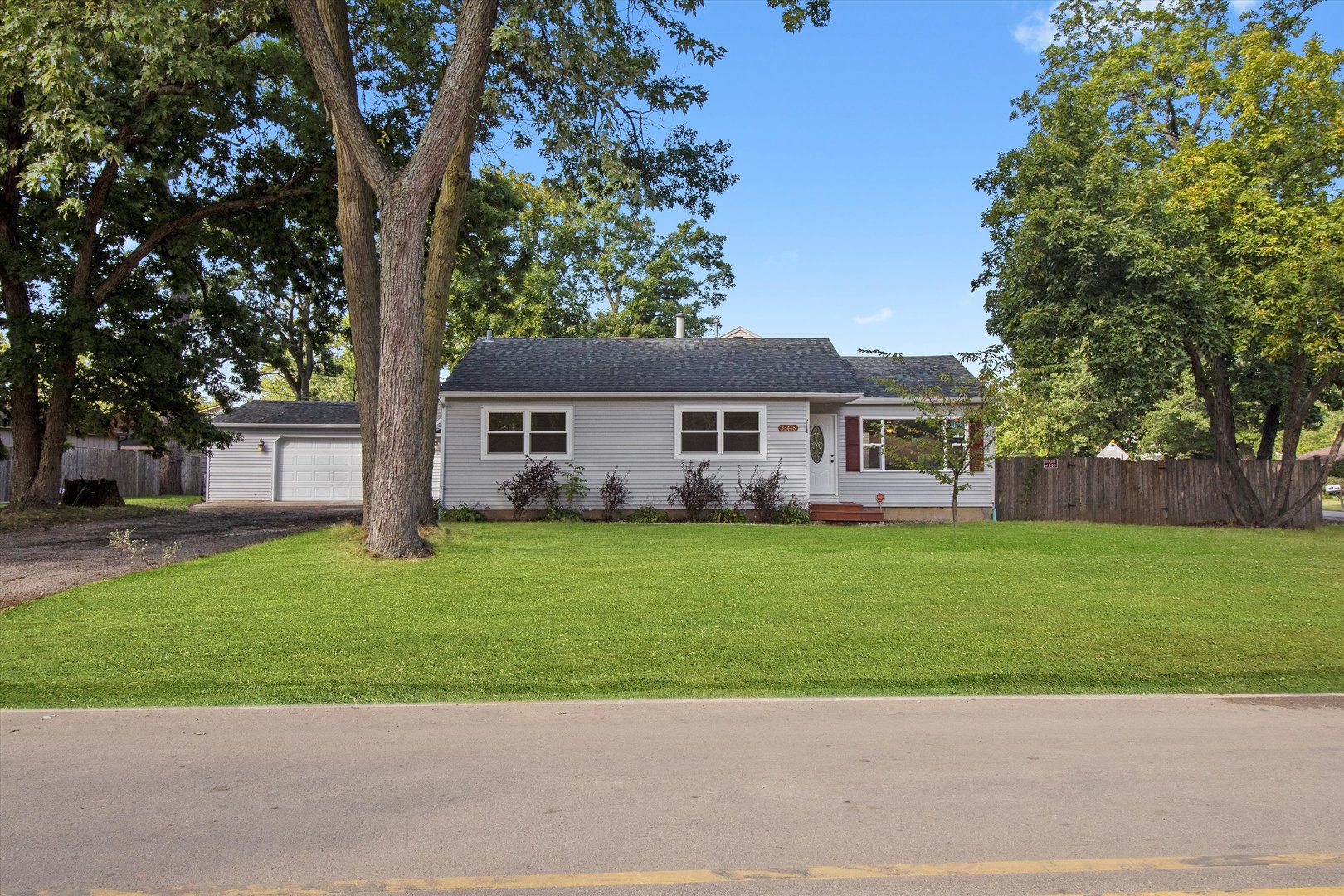 33448 North Greentree Road Grayslake, IL 60030 - Photo 35 of 49 a view of a house with a yard