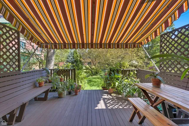 a garden view with a seating space