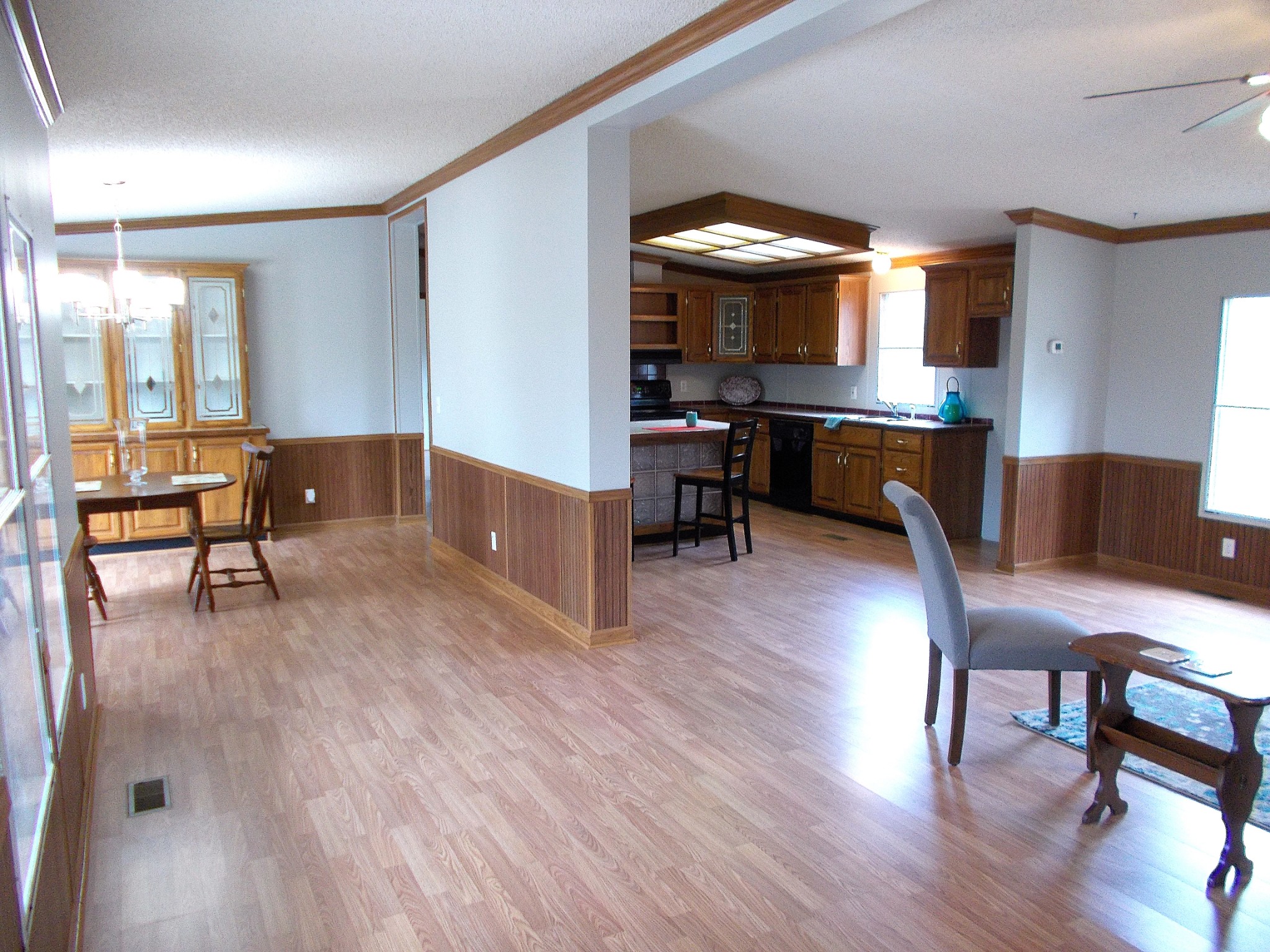 601 Caps Ridge Dickson, TN 37055 - Photo 8 of 34 a living room with furniture and a dining table with wooden floor