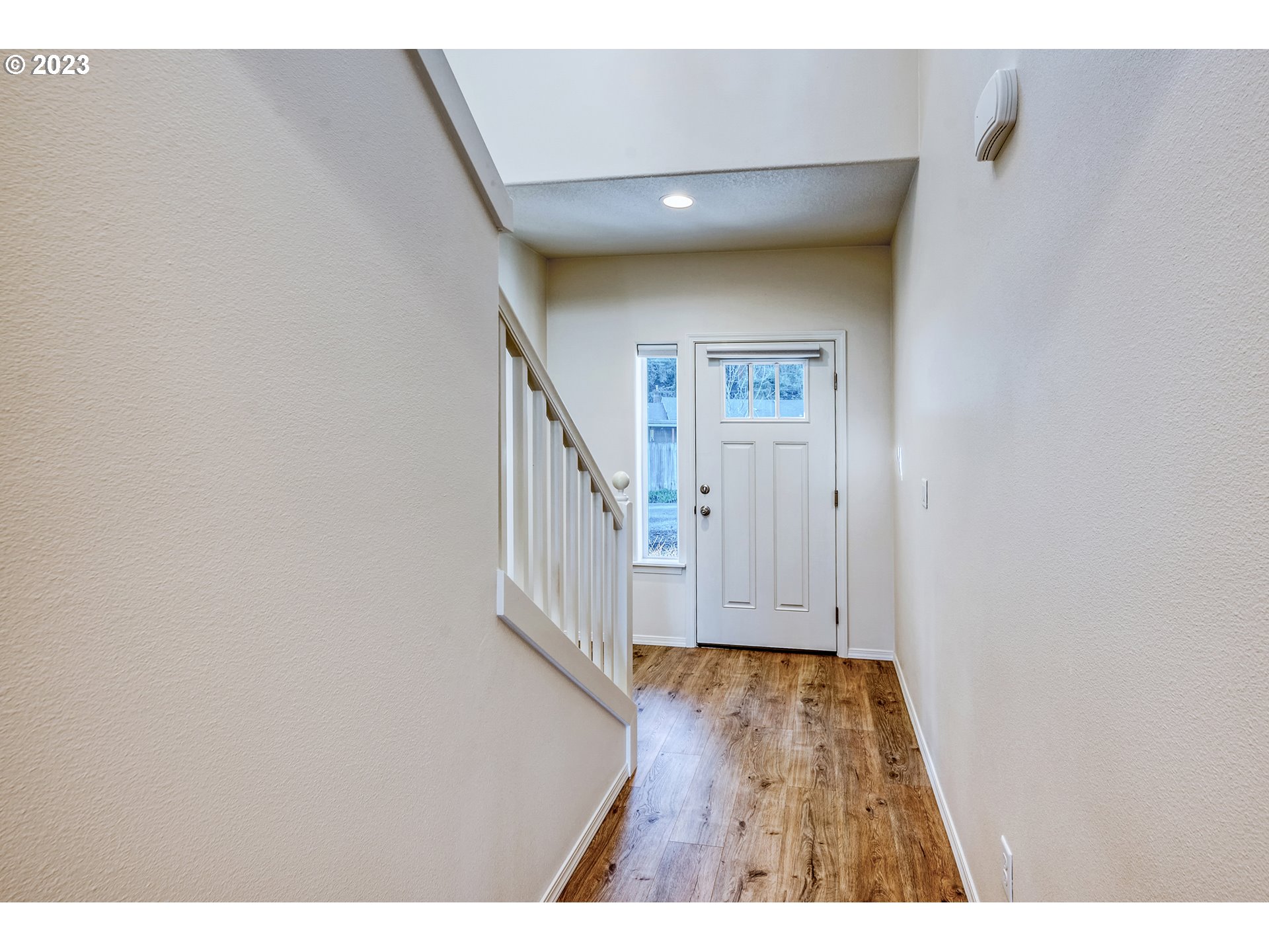 1057 Laura Street Springfield, OR 97477 - Photo 15 of 39 a view of entryway with wooden floor
